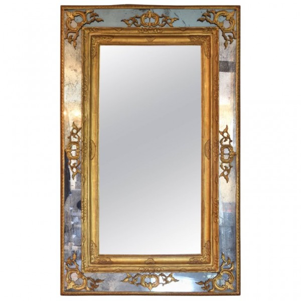 Carved Giltwood and Embossed Gilt-Gesso Mirror