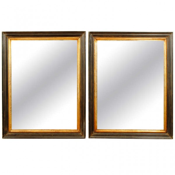 Pair of Ebonized and Giltwood Mirrors