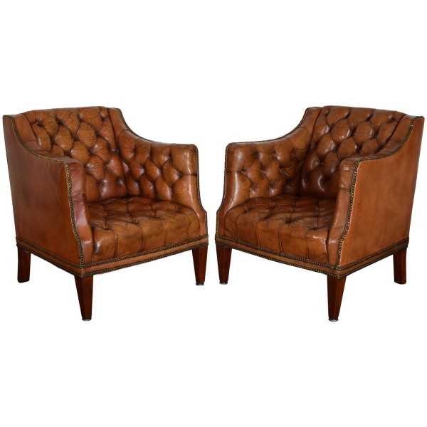 Pair of Mahogany and Tufted Leather Upholstered Bergeres