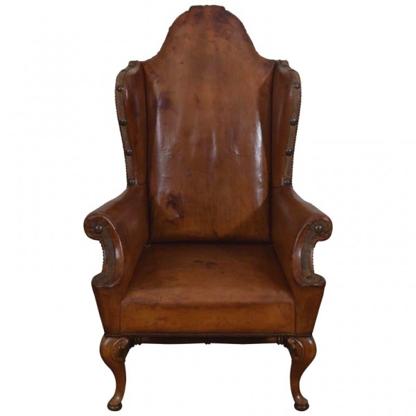 Walnut and Leather Upholstered Wing Chair