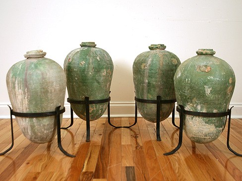 Pair of Green-Painted Terracotta Vessels on Later Iron Stands (previously four)
