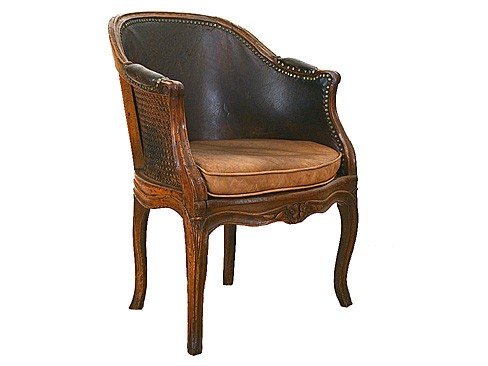 Walnut, Caned, and Leather Upholstered Bergere