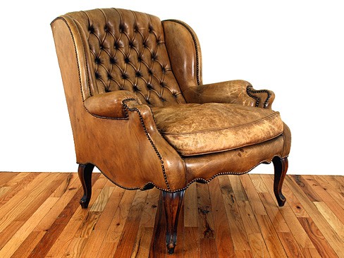 Walnut and Leather Upholstered Wing Chair