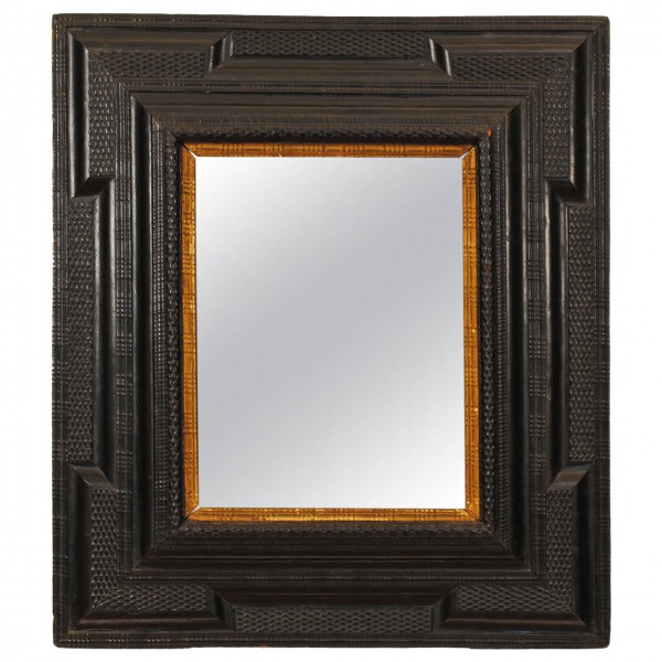 Ebonized and Giltwood Guilloche Mirror