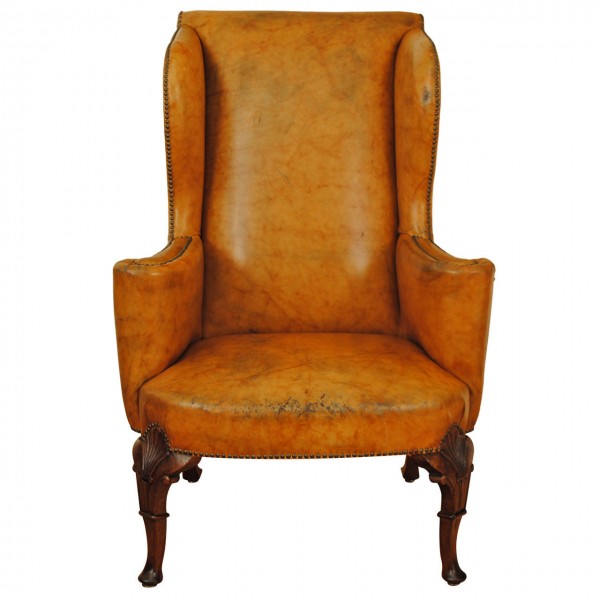 Carved Walnut Leather Upholstered Wing Chair