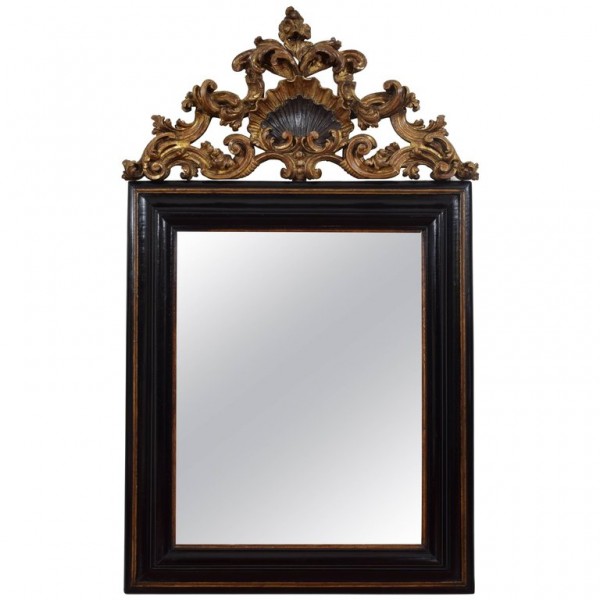 Exceptional Ebonized and Carved Giltwood Wall Mirror