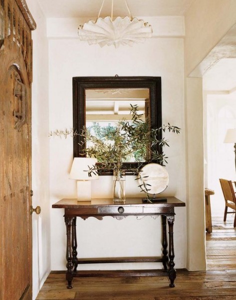 Carved and Ebonized Walnut Mirror