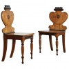 Pair of Walnut and Ebonized Hall Chairs