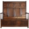 Paneled Back Dark Oak Settle with Storage